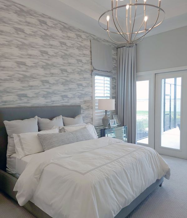 Luxurious bedroom interior with elegant bed and sophisticated decor elements